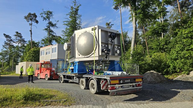 Driver Michael Delicado Garcia (GSI/TRI) transporting the GLAD vacuum chamber toward the FAIR construction site. Driver Michael Delicado Garcia (GSI/TRI) transporting the GLAD vacuum chamber toward the FAIR construction site.